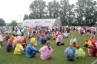 X Latvijas skolu jaunatnes deju svētku dalībnieki Daugavas stadionā