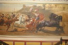 Sienas gleznojums, kura centrā ir Triumfējošs Ahilejs velkot aiz ratiem nedzīvo Hektora ķermeni Trojas vārtu priekšā 20