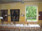 Restorāna dekorācijās izmantotas Muhu salas iedzīvotāju nacionālie dekoratīvie priekšmeti 18