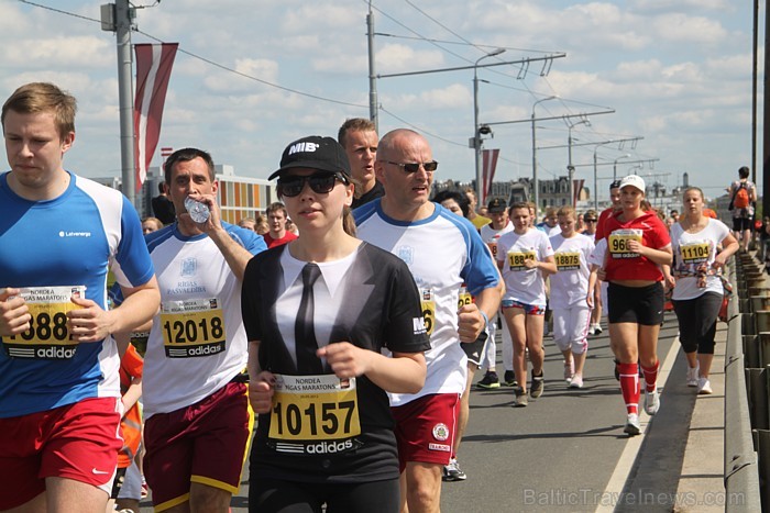 21. Rīgas maratons, kas notika 20.05.2012 un pulcēja dažādās distancēs 18 180 skrējējus (www.wess-select.lv) 75697