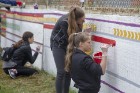 Vecmīlgrāvieši Latvijai simtgadē dāvina latviski apgleznotu sienu 7